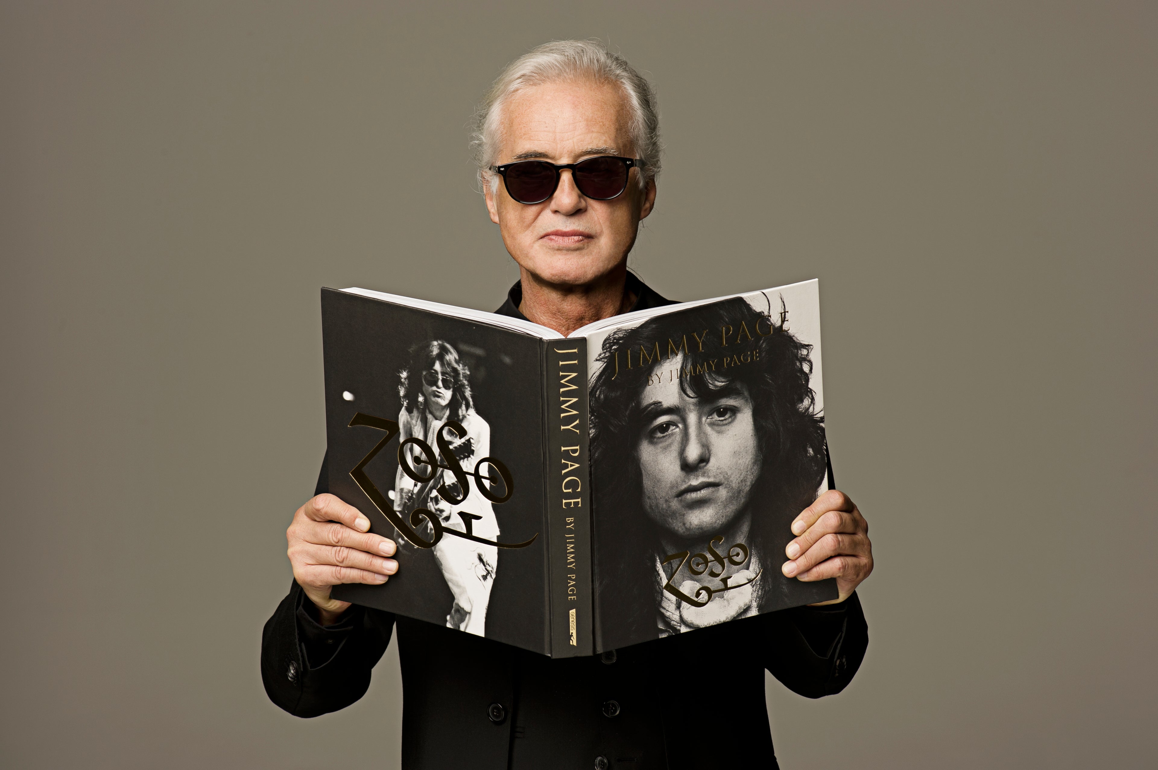 Jimmy Page with his book published by Genesis Publications Jimmy Page by Jimmy Page